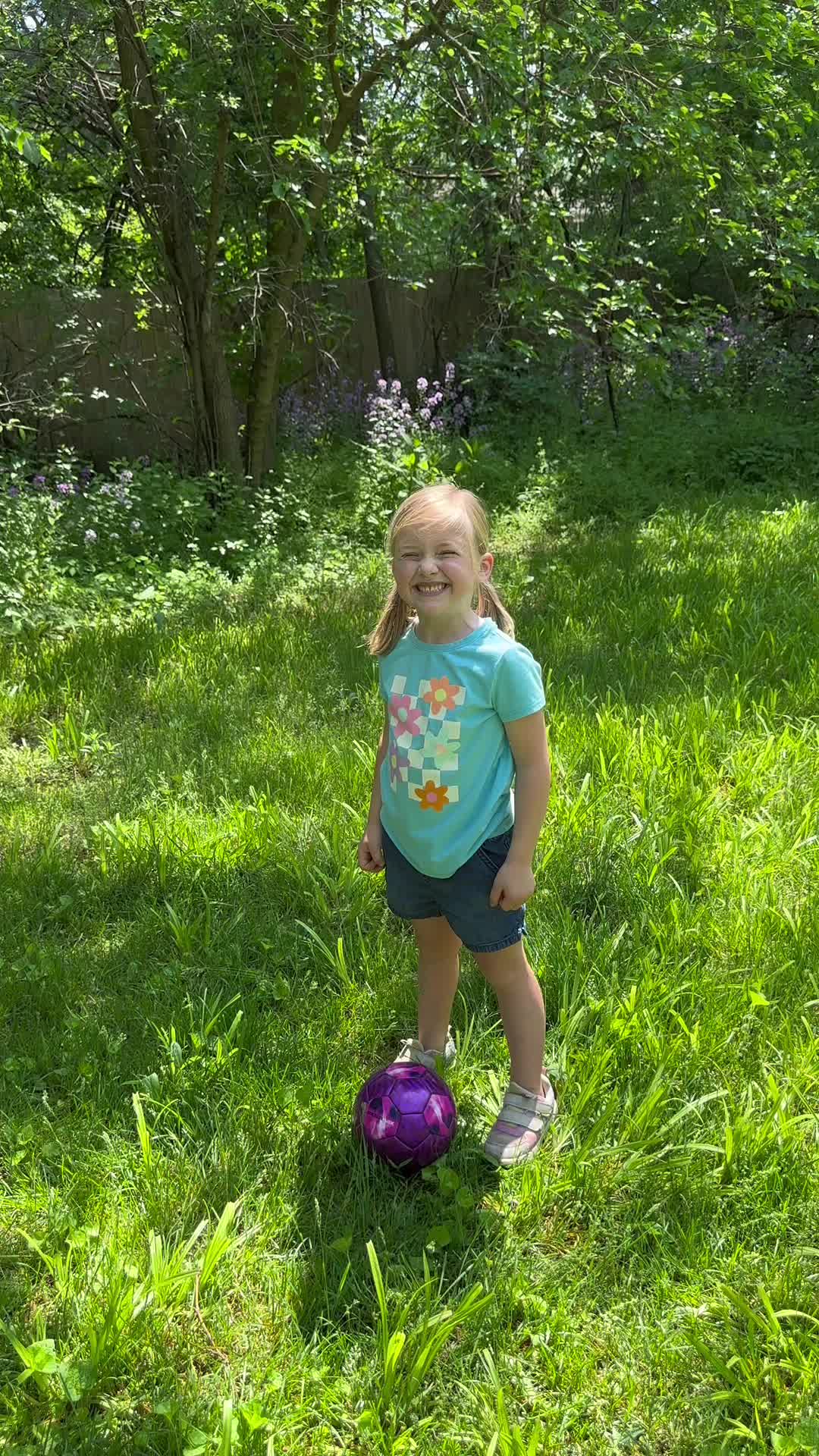 Happy child holding her personalized book